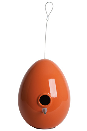J Schatz glossy stoneware Egg Birdhouse in bittersweet  orange ($155 at jschatz.com). Available in seven colors, this birdhouse is suitable for chickadees, wrens and smaller birds. Sorry, robins ...