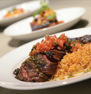 The rosy-pink slices of grilled carne asada.