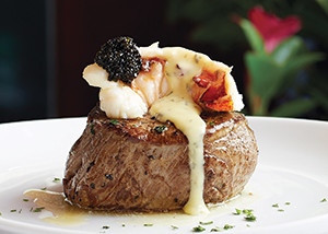 For fine dining, it’s hard to top a premium steak. Fleming’s in West Des Moines tops its 12-ounce main filet mignon with truffled poached lobster.