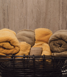 A basket filled with more than enough bath towels, hand towels and washcloths for their visit will spare guests having to ask for fresh ones. 