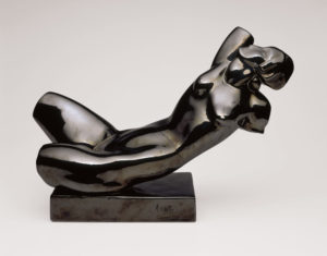 Working in ceramic with black glaze, Alexander Archipenko created "Reclining Torso" in 1921. © 2015 Estate of Alexander Archipenko/Artists Rights Society (ARS), New York